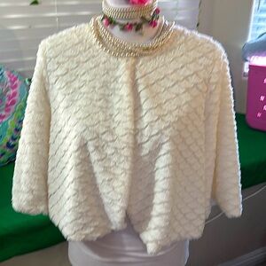 Haani cream white faux fur cape style coat with one hook and eye closure